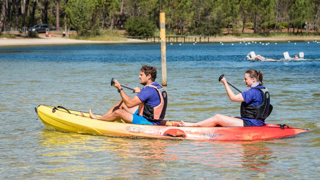 Kayaking trip on a lake as part of a team-building event, organised by XXL Happyness